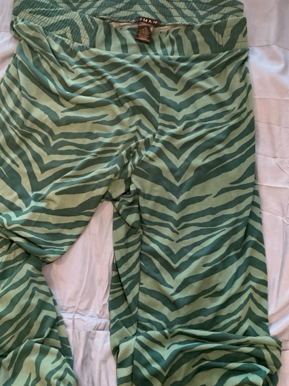 IMAN women’s green zebra print pants